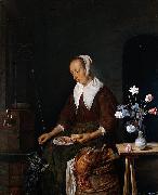 Gabriel Metsu Woman feeding a cat painting